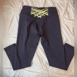 Fabletics Charcoal Leggings with Yellow Lattice Back Detail